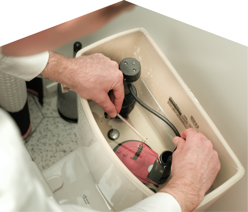 669 Heat plumbing specialist adjusts internal components of a toilet tank, with tile flooring visible in the background. 669 Heat plumbing specialist adjusts internal components of a toilet tank, with tile flooring visible in the background.