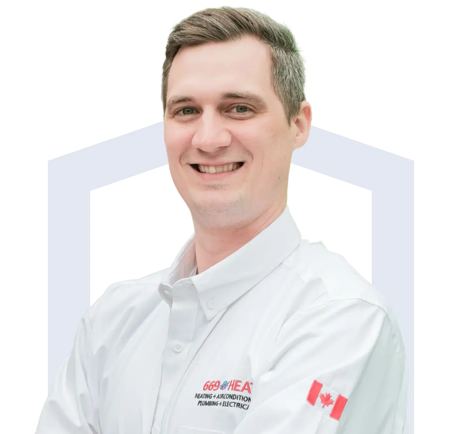 669-hero 669 Heat team member in his white uniform, smiling broadly with teeth visible.